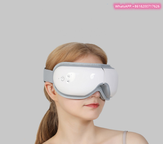 eye massager with heat compression